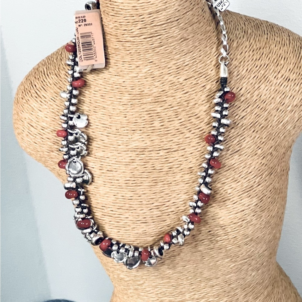 UnoDe50 necklace  and two bracelets.